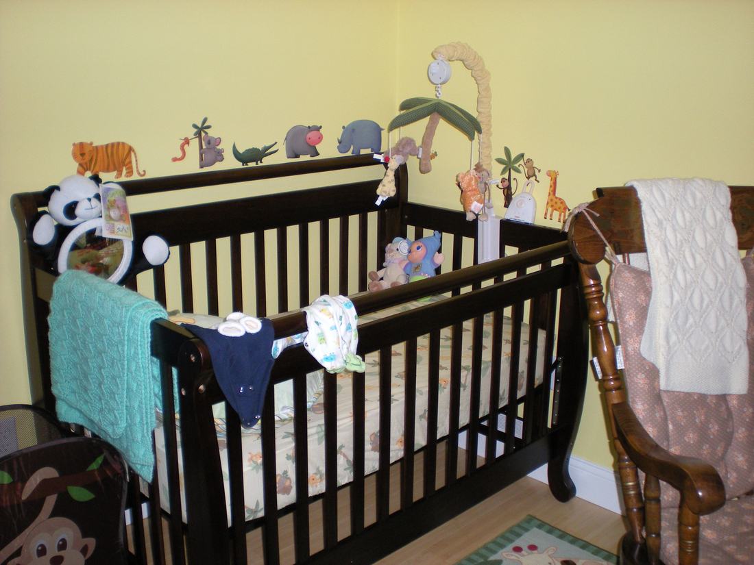 An empty baby bed