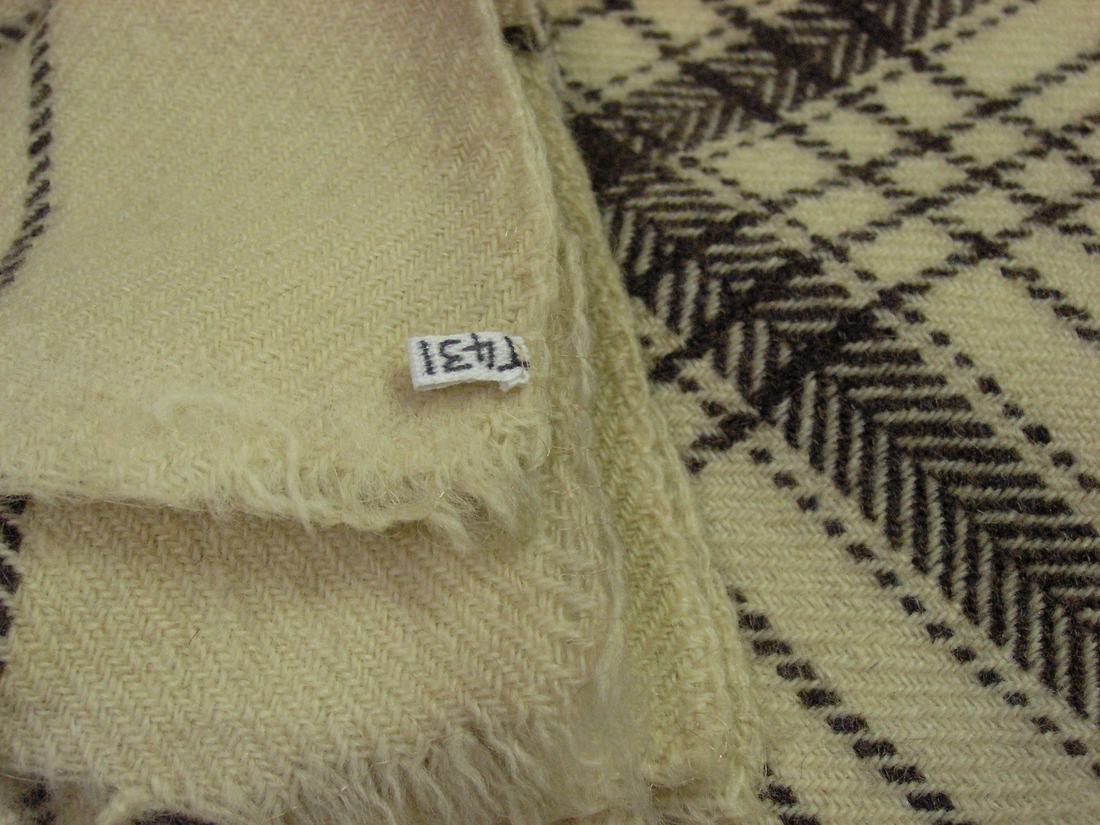 A folded woollen blanket
